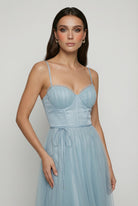 Elegant blue midi wedding guest dress by Lumina Wear featuring a flattering silhouette and sophisticated design.