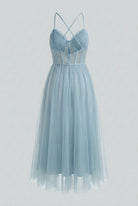 Elegant blue midi wedding guest dress by Lumina Wear featuring a flattering silhouette and stylish design.