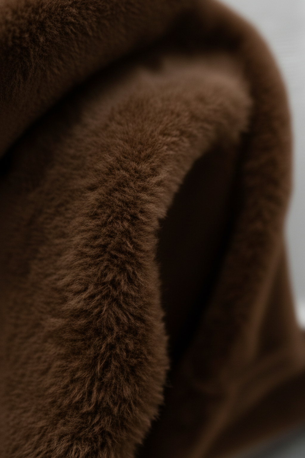 Elegant brown turtleneck sweater from Lumina Wear featuring a slim fit, styled on a model for a sophisticated look.
