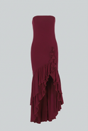 Elegant burgundy strapless dress with asymmetrical ruffle by Lumina Wear, shown on a model emphasizing its stylish design.