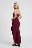 Victoria Burgundy Strapless Dress by Lumina Wear featuring an elegant asymmetrical ruffle for chic evening wear.