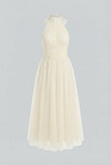 Cream midi dress by Lumina Wear featuring a flowy, elegant design and stylish silhouette for sophisticated occasions.