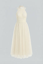 Elegant cream Victoria midi dress by Lumina Wear featuring a flowy design and midi length, perfect for stylish occasions.