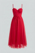 Red Victoria Lumina Wear elegant flowy A-line midi dress, showcasing a sleek silhouette and stylish midi length.