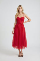Red Victoria Lumina Wear elegant flowy A-line midi dress, showcased with a fitted bodice and flared skirt.