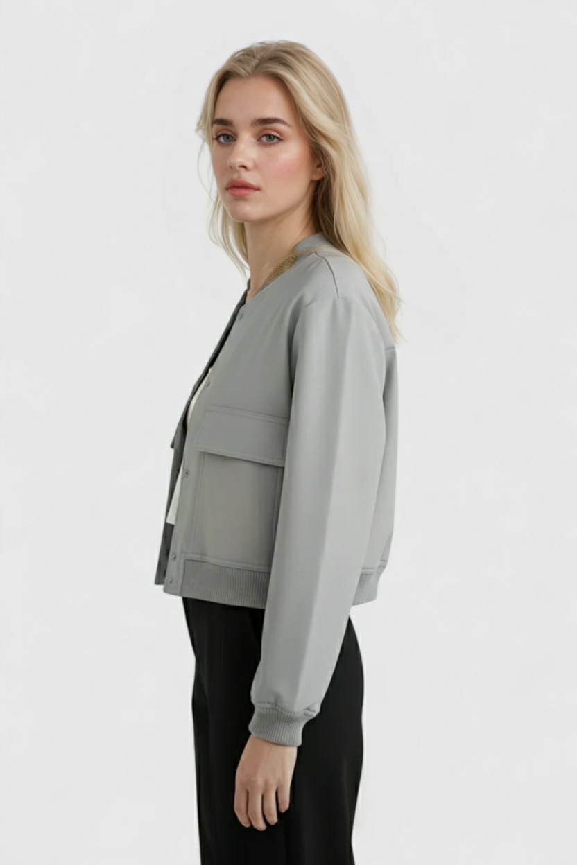 Elegant gray Victoria bomber jacket by Lumina Wear, featuring a timeless design and stylish fit for a modern look.
