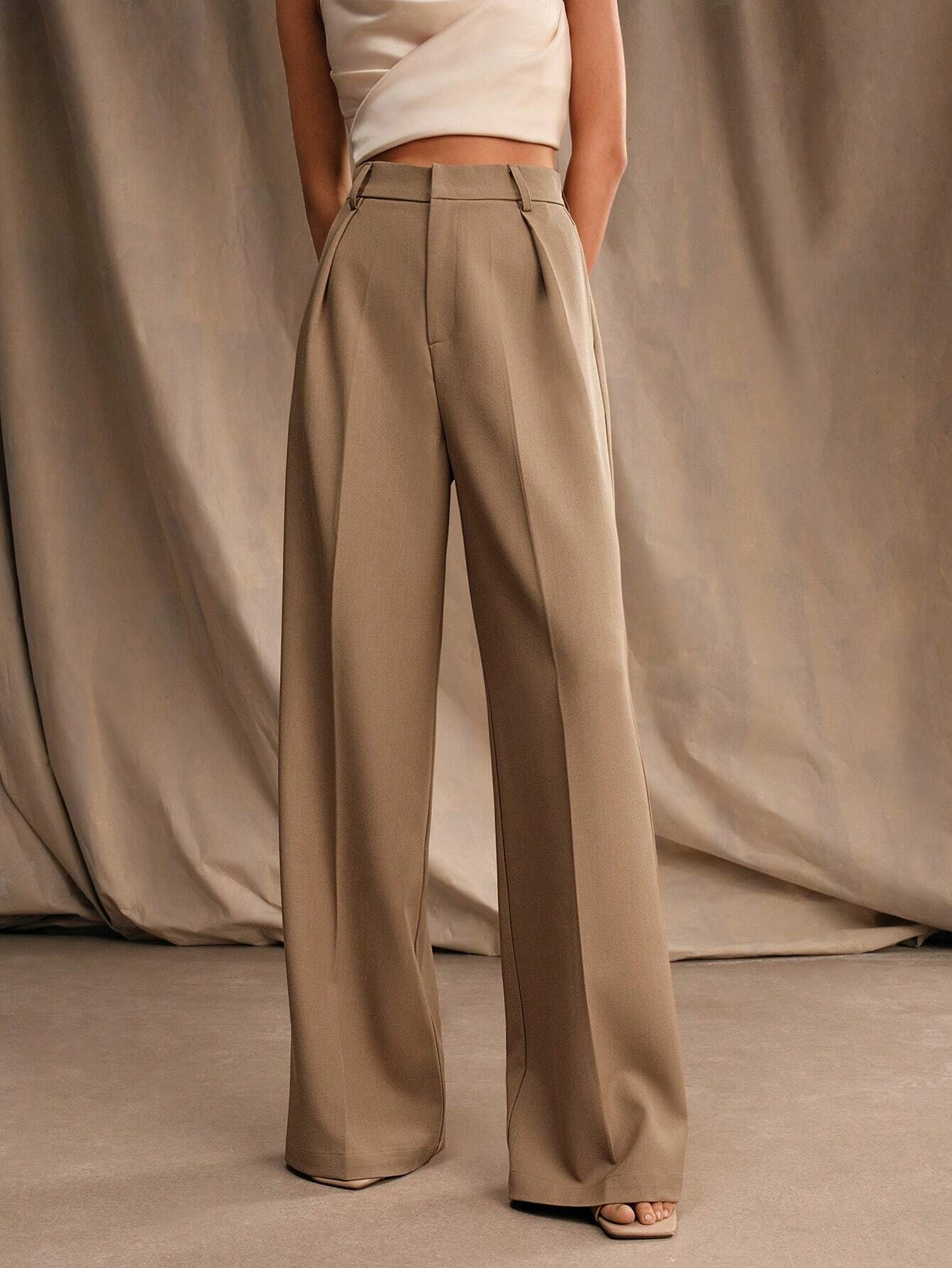 Black Victoria Lumina Wear high waist wide leg trousers, stylish and elegant with a relaxed fit, perfect for modern fashion.