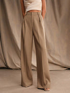 Black Victoria Lumina Wear high waist wide leg trousers, stylish and elegant with a relaxed fit, perfect for modern fashion.