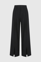 Women's high-waisted black trousers with pleats from Lumina Wear, featuring a tailored fit and elegant design.