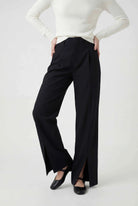 Elegant black high-waisted women's trousers with pleats from Lumina Wear, featuring a tailored fit and classic style.