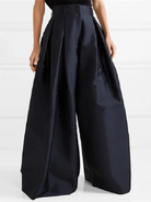 Victoria high-waisted pleated trousers by Lumina Wear in army green, showcasing tailored fit and elegant design.