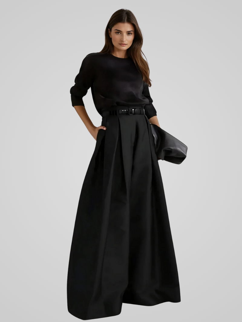 Black Victoria high-waisted trouser skirt with A-line cut by Lumina Wear, showcasing a sleek, elegant silhouette.