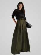 Black Victoria high-waisted A-line trouser skirt by Lumina Wear, tailored fit with sleek, elegant design perfect for stylish office wear.