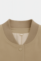 Victoria khaki bomber jacket by Lumina Wear featuring a loose fit, stylish design, and lightweight fabric for a casual look.