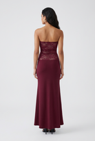 Wine red Victoria wedding dress by Lumina Wear featuring elegant lace, mermaid silhouette, and corset back.