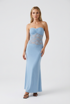 Elegant lace mermaid wedding dress by Lumina Wear featuring a sculpted silhouette and intricate lace details.