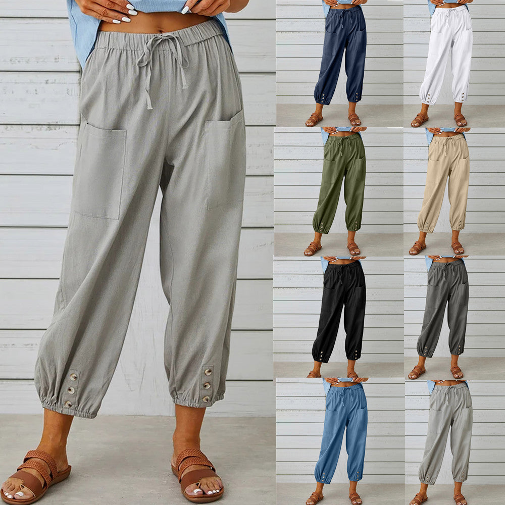 White Victoria Lumina Wear lightweight wide-leg trousers, shown flat with smooth fabric and clean tailoring.