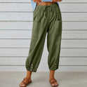White Victoria Lumina Wear lightweight wide-leg trousers, relaxed fit, stylish women's pants with a modern silhouette.