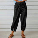 White Victoria Lumina Wear lightweight wide-leg trousers with a relaxed fit, stylish and comfortable for everyday wear.