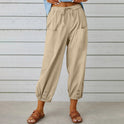 White Victoria Lumina Wear lightweight wide-leg trousers with a relaxed fit and elegant style, perfect for casual or chic outfits.