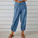 Victoria Lumina Wear elegant lightweight wide-leg trousers in white, showcasing a comfortable and stylish pants design.