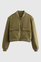 Victoria Lumina Wear military green bomber jacket with comfortable fit, stylish design, and zip closure, shown on a model.
