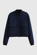 Elegant navy bomber jacket by Lumina Wear, featuring a timeless design and classic silhouette in lightweight fabric.
