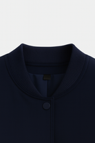 Elegant navy bomber jacket by Lumina Wear, showcasing timeless design and stylish fit, perfect for a sleek, modern look.