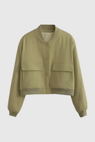 Olive green Victoria bomber jacket by Lumina Wear featuring a timeless design and stylish fit, shown on a model.