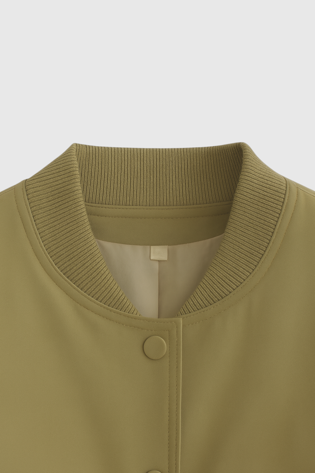Olive green Lumina Wear Victoria bomber jacket with elegant, timeless design, displayed on a mannequin.