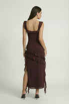 Victoria Lumina Wear elegant open-back maxi dress with flattering silhouette, brown color, perfect for stylish occasions.