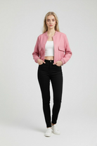 Elegant pink Lumina Wear bomber jacket, Victoria style, with timeless design and modern fit in a close-up view.
