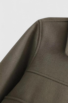 Pink Victoria jacket by Lumina Wear featuring classic button closure and elegant design, shown in army green color.
