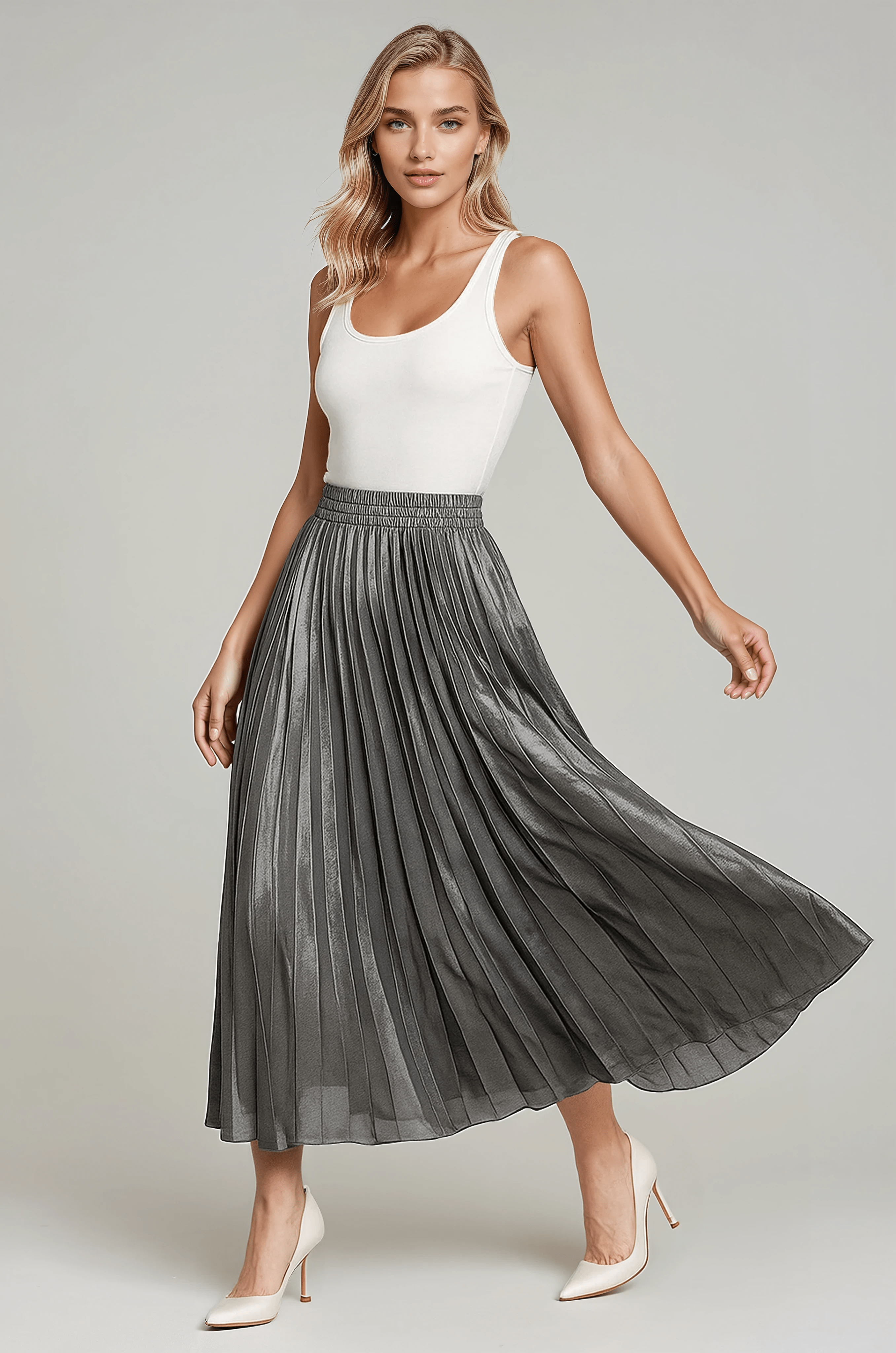 Gold pleated maxi skirt for women from Lumina Wear, featuring elegant flowy fabric and a stylish design.