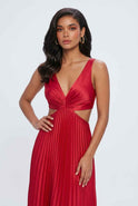 Elegant red pleated midi dress by Lumina Wear featuring a flattering fit, showcased on a model with stylish accessories.