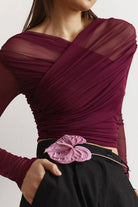 Victoria burgundy ruched mesh top with long sleeves from Lumina Wear, elegant blouse with fitted design and sheer fabric details.