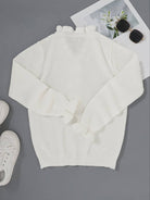 Victoria women's blouse by Lumina Wear featuring elegant ruffle design and decorative buttons, stylish and feminine.