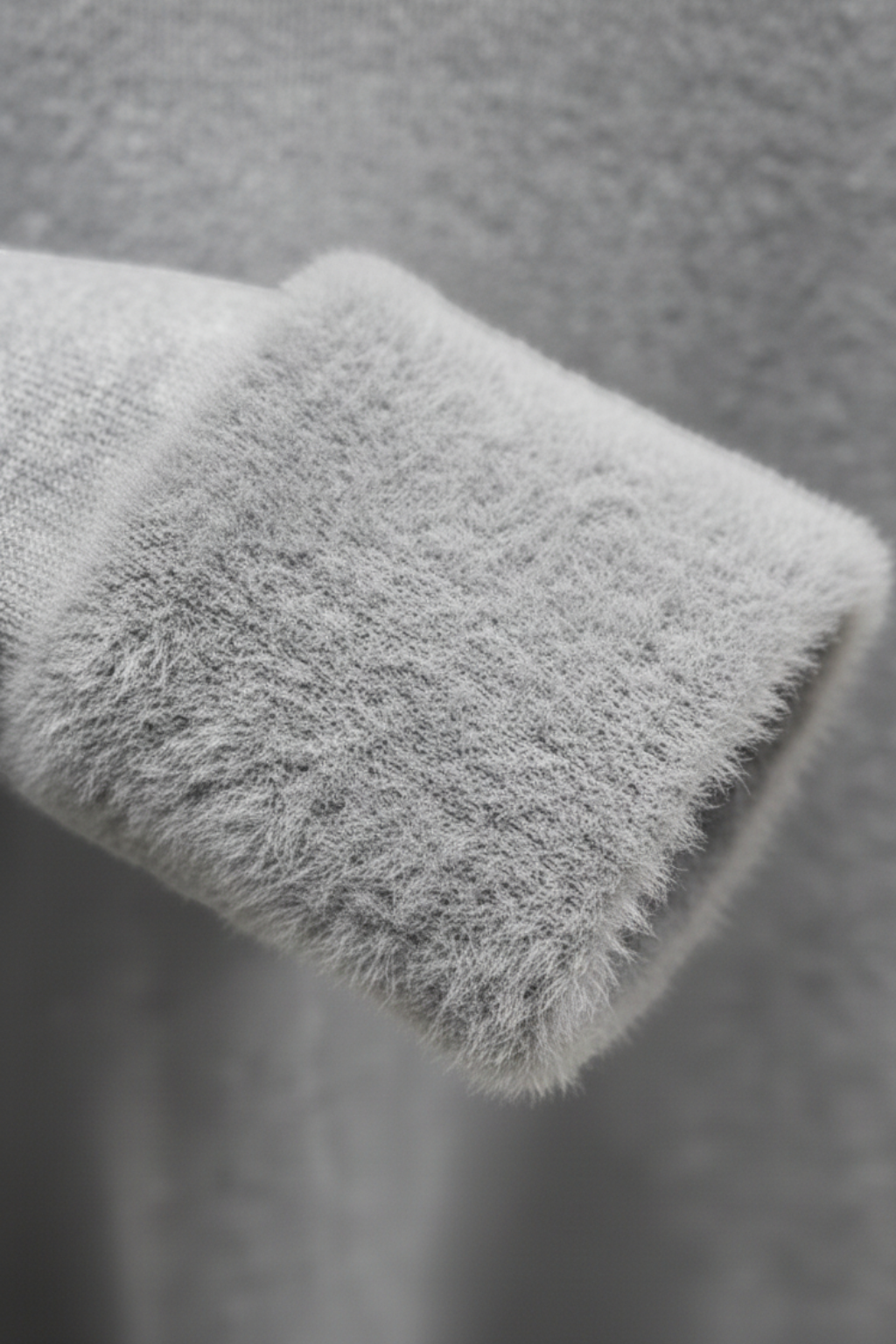 Lumina Wear Victoria gray slim fit turtleneck sweater with velvety texture, showcasing a stylish and cozy knit design.