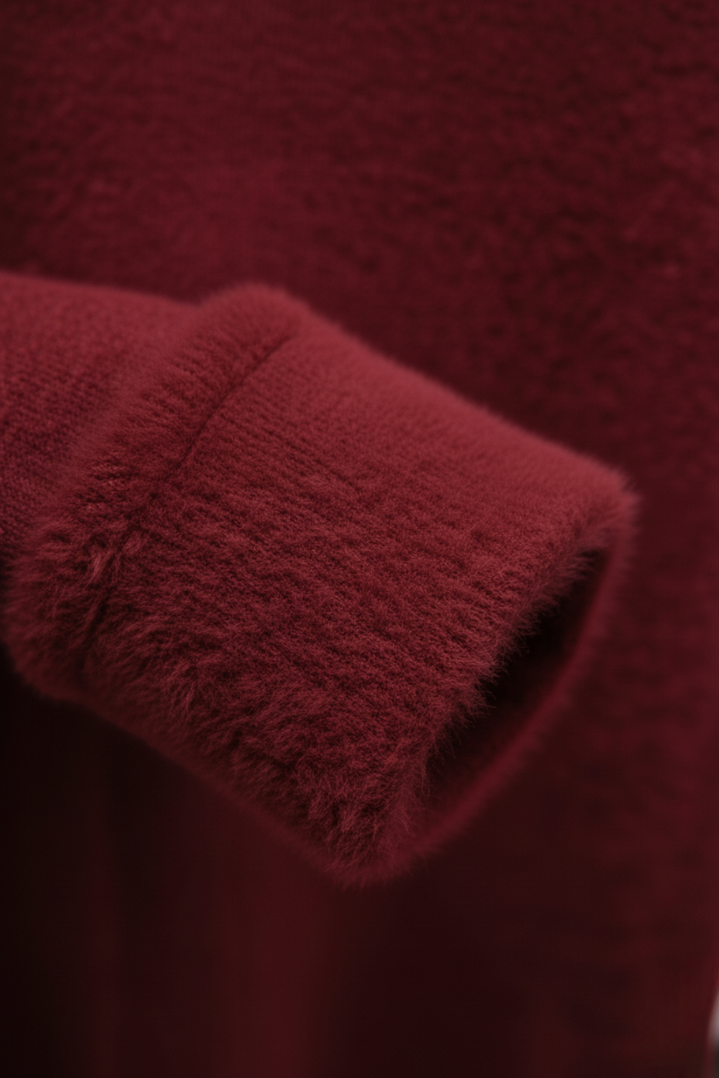 Lumina Wear Victoria burgundy slim fit turtleneck sweater, elegant knit design, close-up of the cozy, stylish sweater fabric.