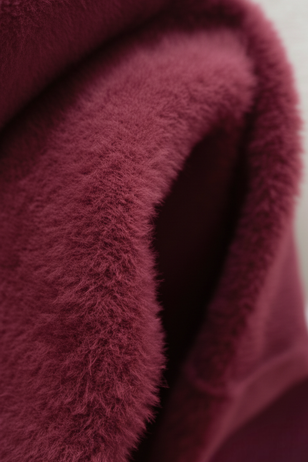 Lumina Wear Victoria burgundy slim fit turtleneck sweater, elegant knit sweater for women, close-up of the cozy, stylish garment.