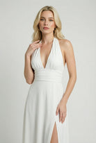 Elegant white backless summer dress by Lumina Wear featuring a flattering silhouette and stylish design.