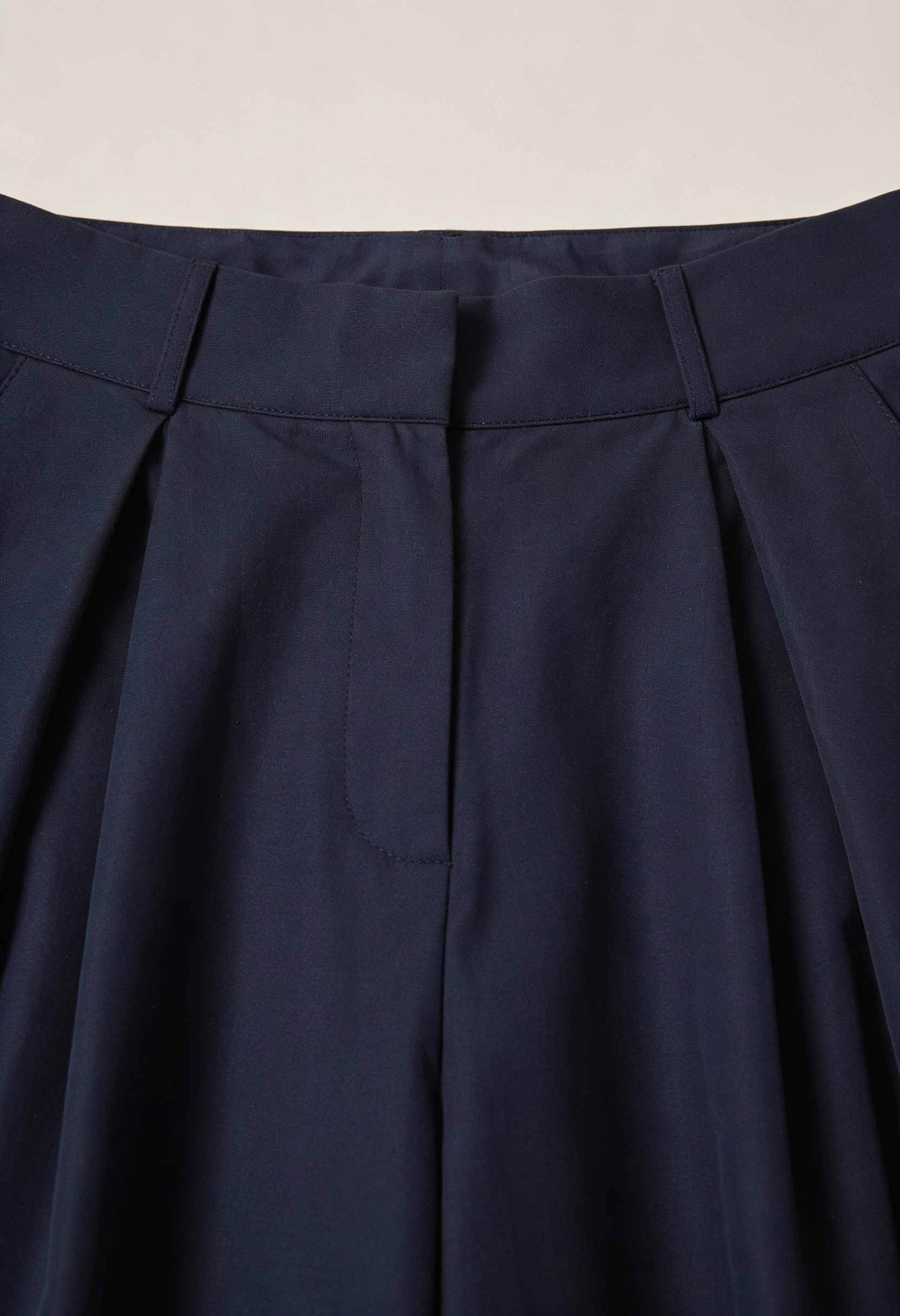 Navy blue Victoria Lumina Wear wide-leg trousers with stretch fabric, tailored fit, and comfortable design for elegant style.