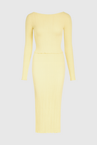 Elegant yellow knitted maxi skirt set with slim fit from Lumina Wear, featuring a stylish and comfortable design.