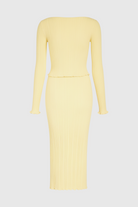 Elegant yellow knitted maxi skirt set with slim fit from Lumina Wear, featuring a stylish, coordinated skirt and top ensemble.