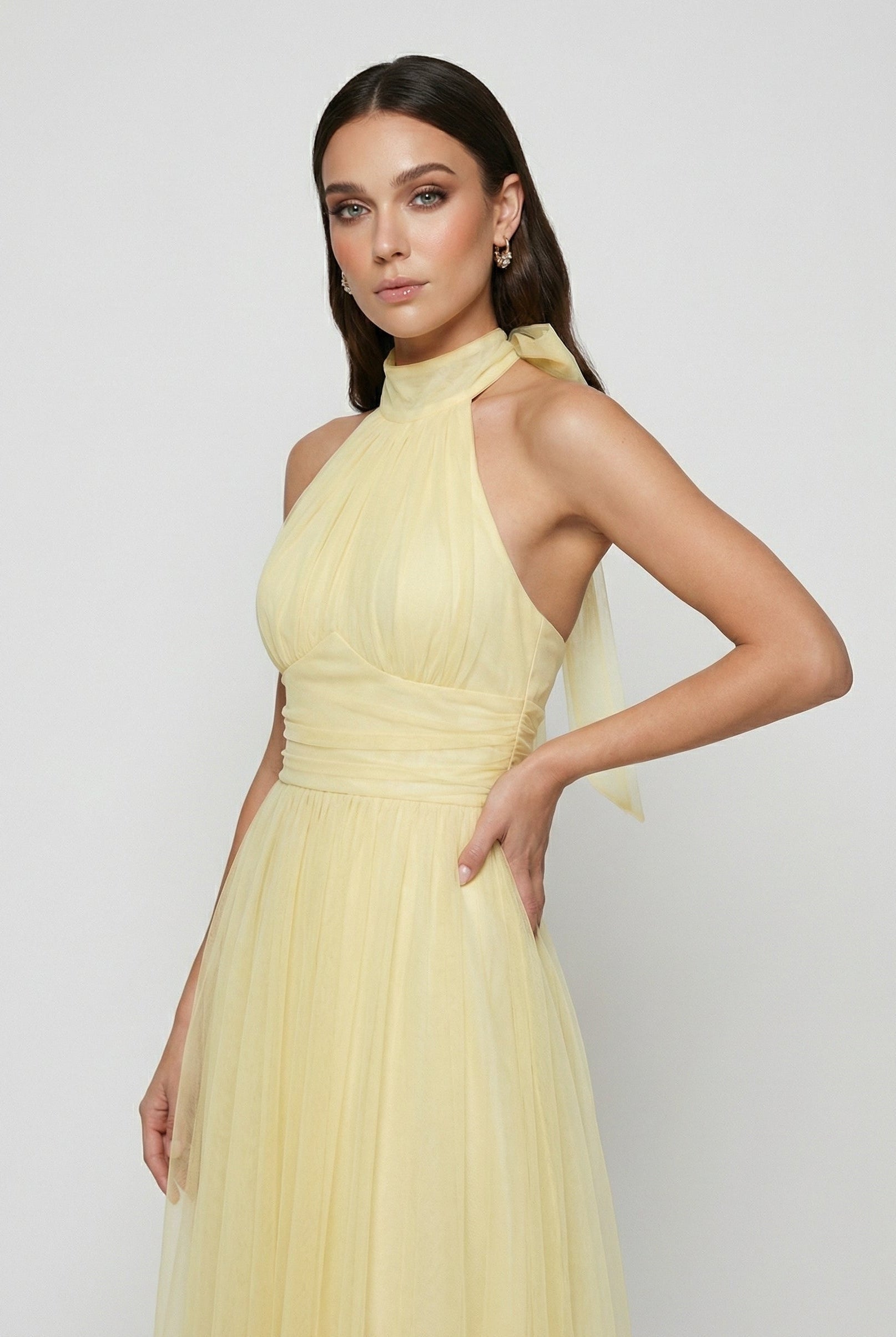 Yellow midi dress by Lumina Wear featuring a high neck design, elegant silhouette, perfect for women’s fashion.