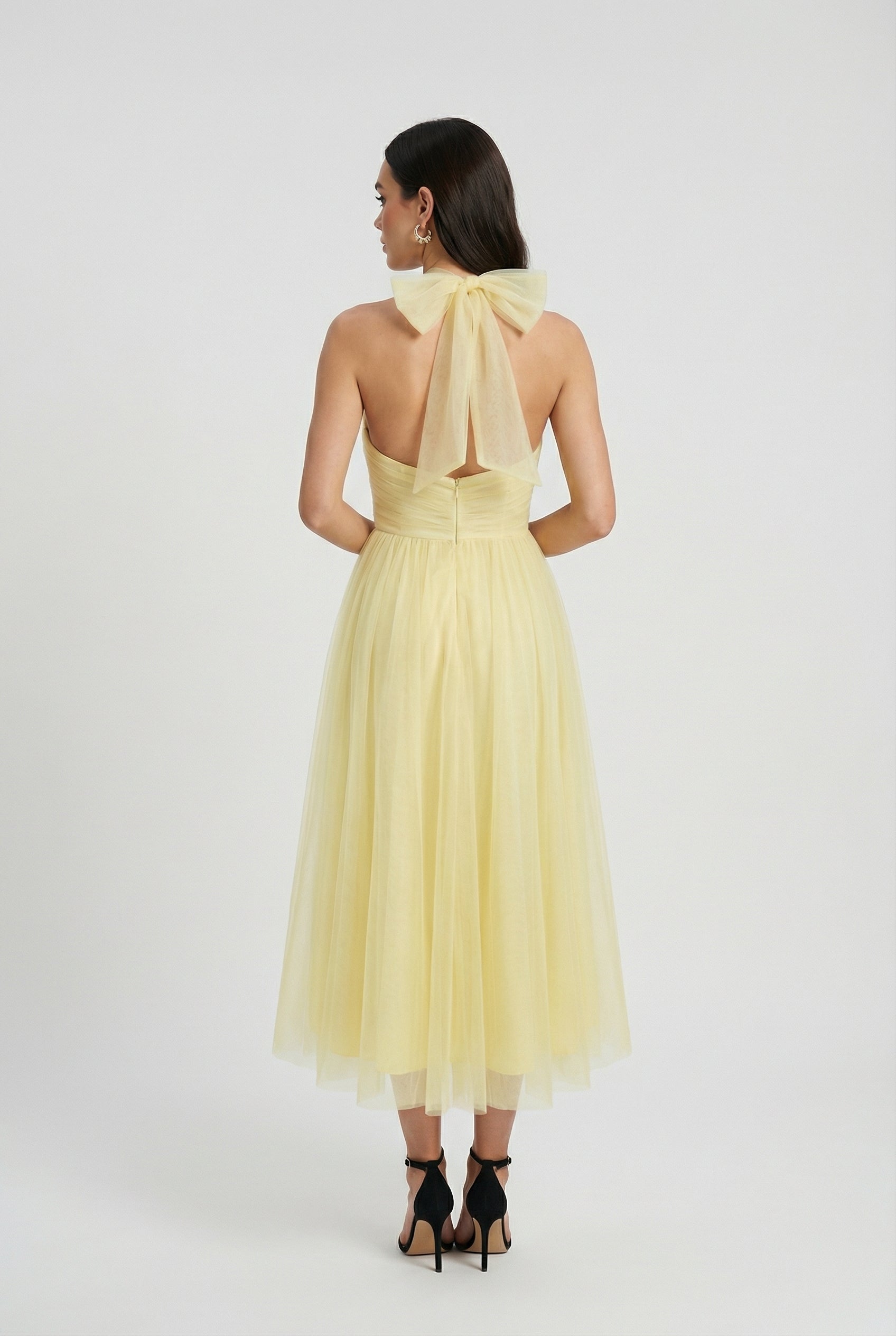 Yellow midi dress with high neck design from Lumina Wear, elegant women's dress perfect for stylish occasions.