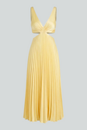 Yellow pleated dress with flowing silhouette by Lumina Wear, featuring elegant design and lightweight fabric.