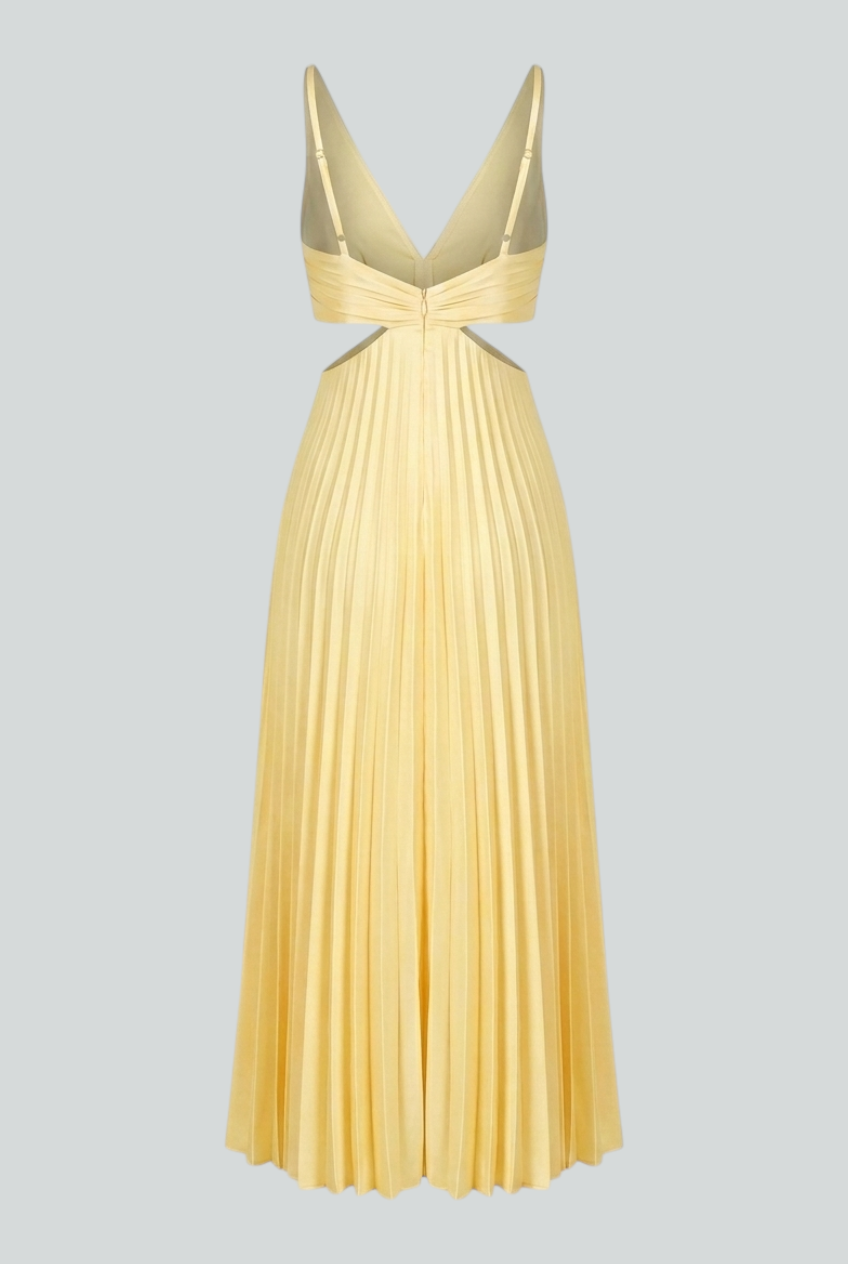 Yellow pleated dress by Lumina Wear featuring a flowing silhouette and elegant design, perfect for women’s fashion.