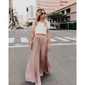 Brown Victoria flowy long skirt with high waist from Lumina Wear, showcasing its elegant, lightweight fabric and relaxed fit.