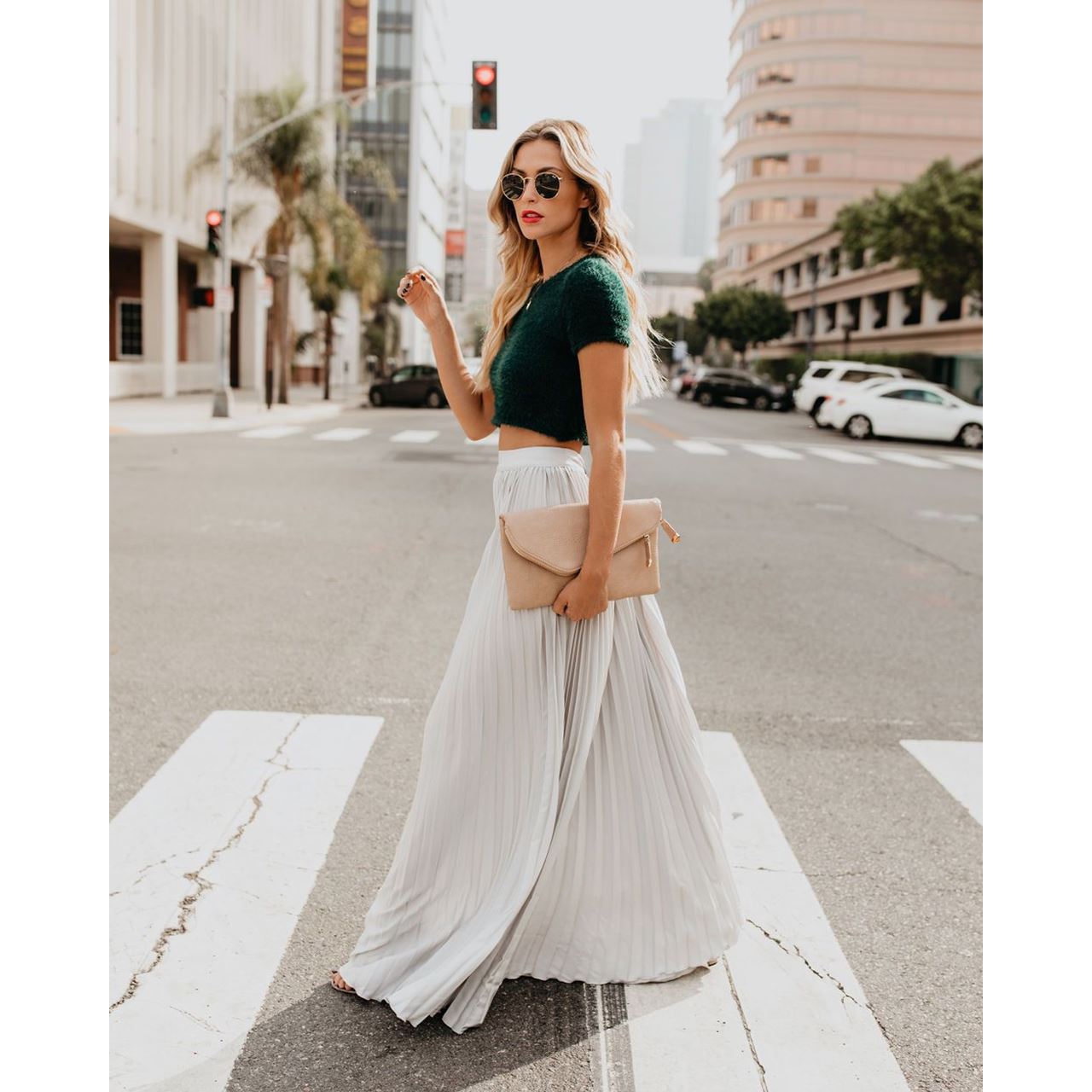 Flowy brown high-waist maxi skirt by Lumina Wear, featuring a graceful silhouette and flowing fabric style.